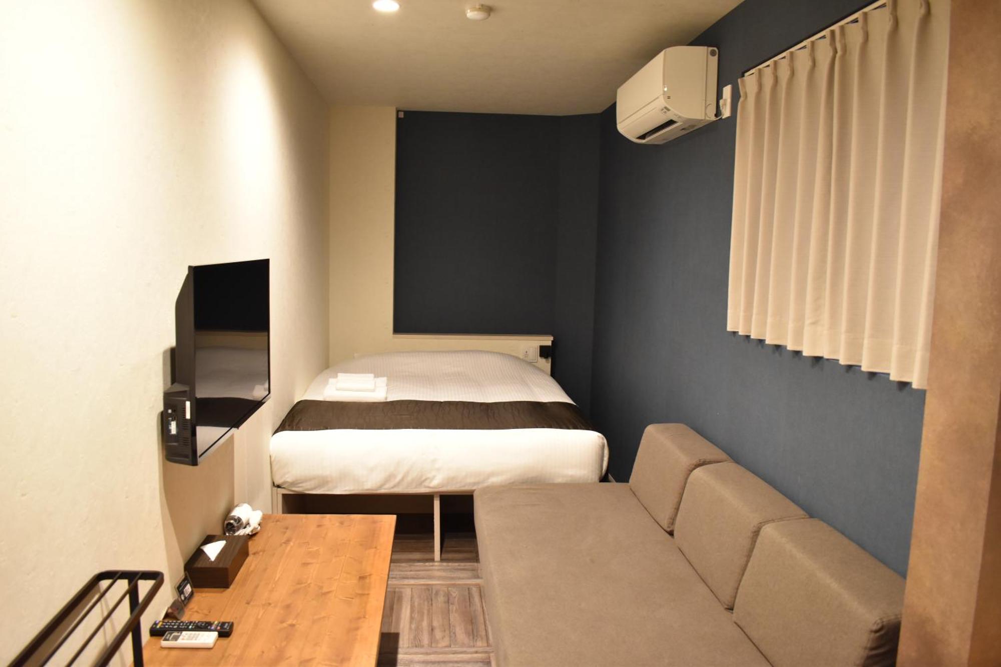 Отель Shinsaibashi House Осака Номер фото